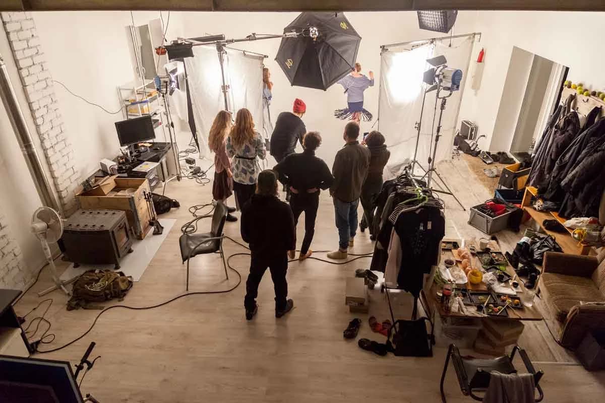 Plastic-draped softbox lighting setup for a hemp product video shoot