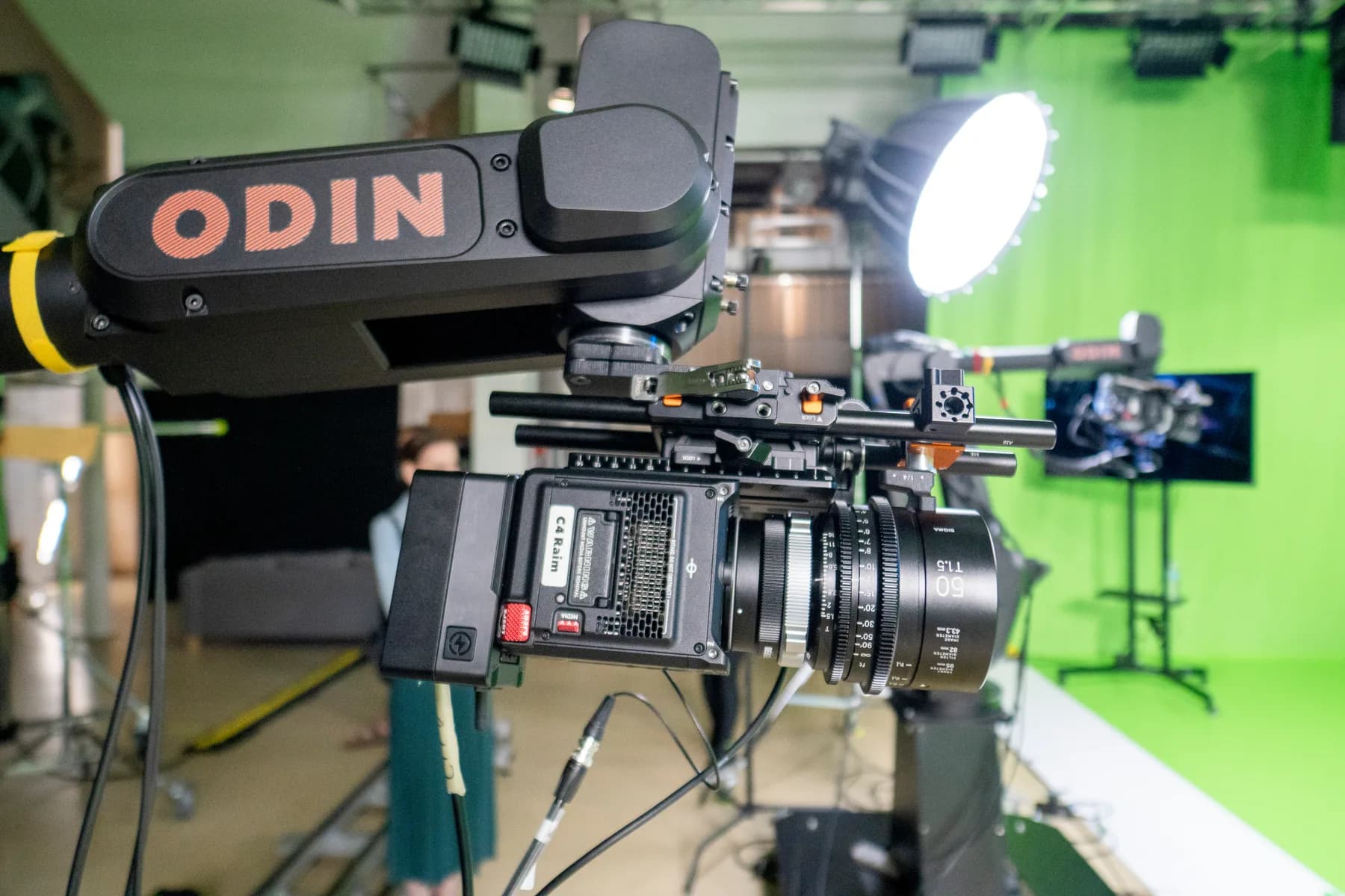 Close-up of a cinema camera mounted on a robotic motion-control arm
